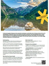 Vilsalpsee with mountains in the background and yellow information box on the right