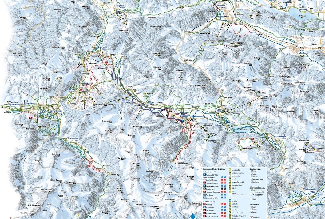 Übersichtliche topografische Karte eines Skigebiets mit Pisten, Liften und Ortschaften