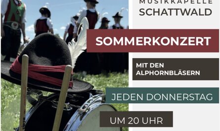 Square concert of the music band and alphorn blowers Schattwald